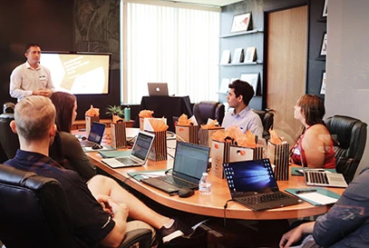 manager hosting a presentation to his employees